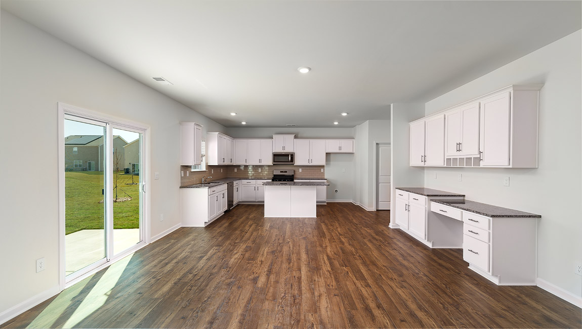 Kitchen and breakfast area with sliding glass back door