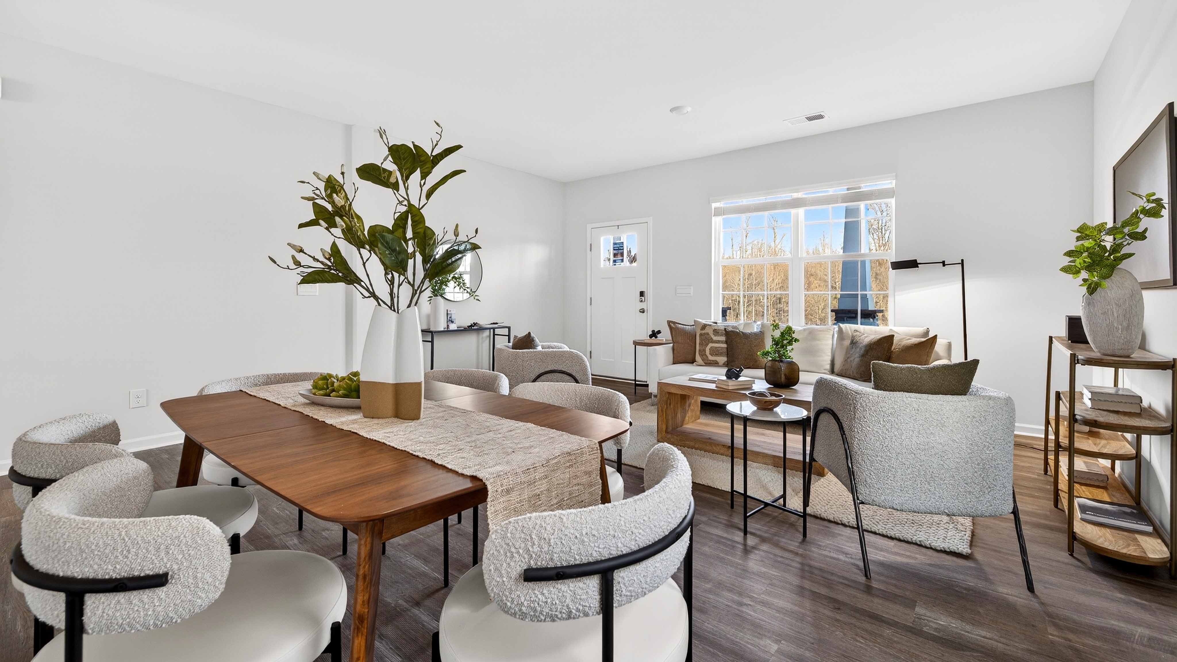 Spacious family room with large window and fireplace
