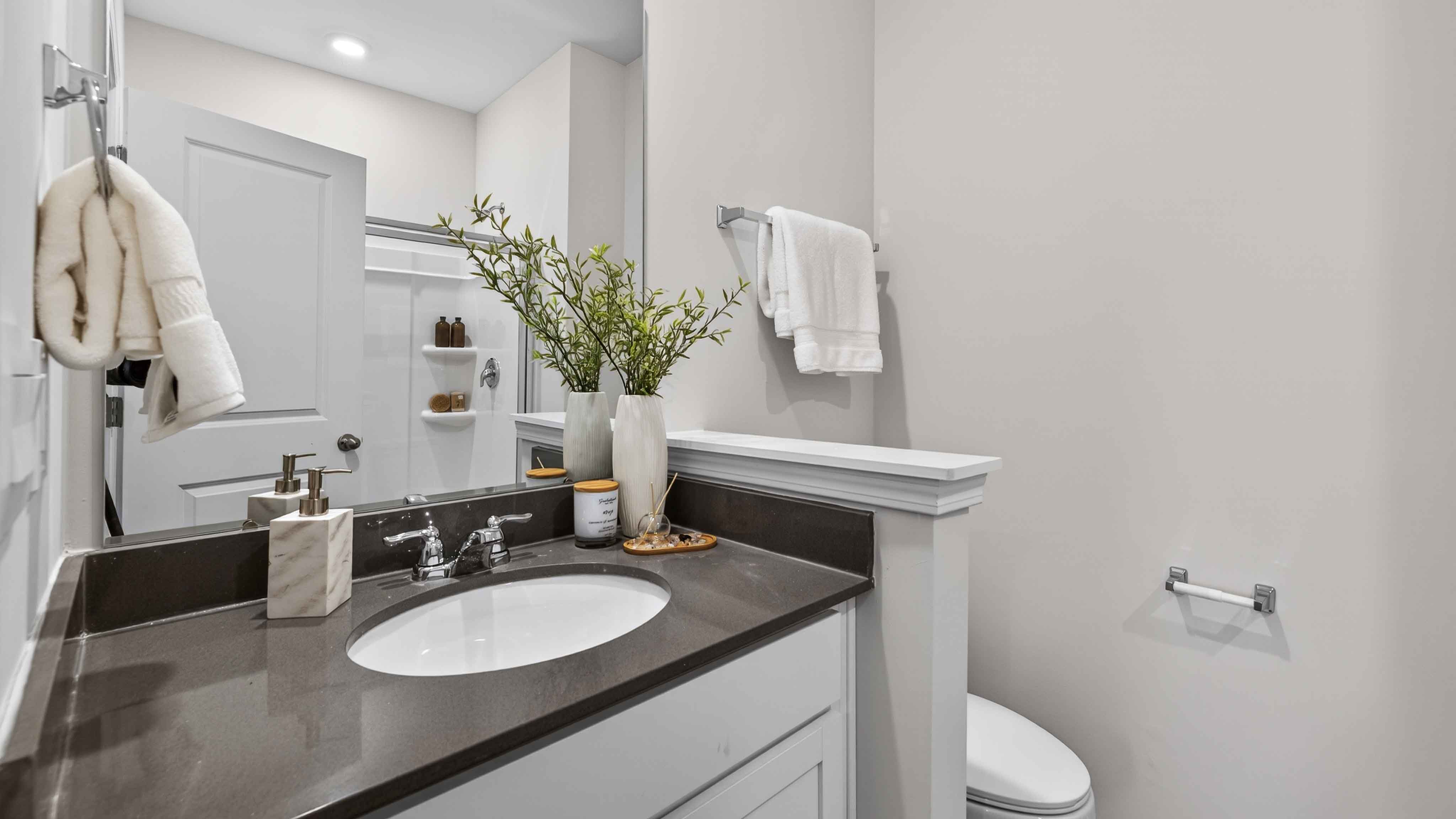 Carpeted bedroom with large window