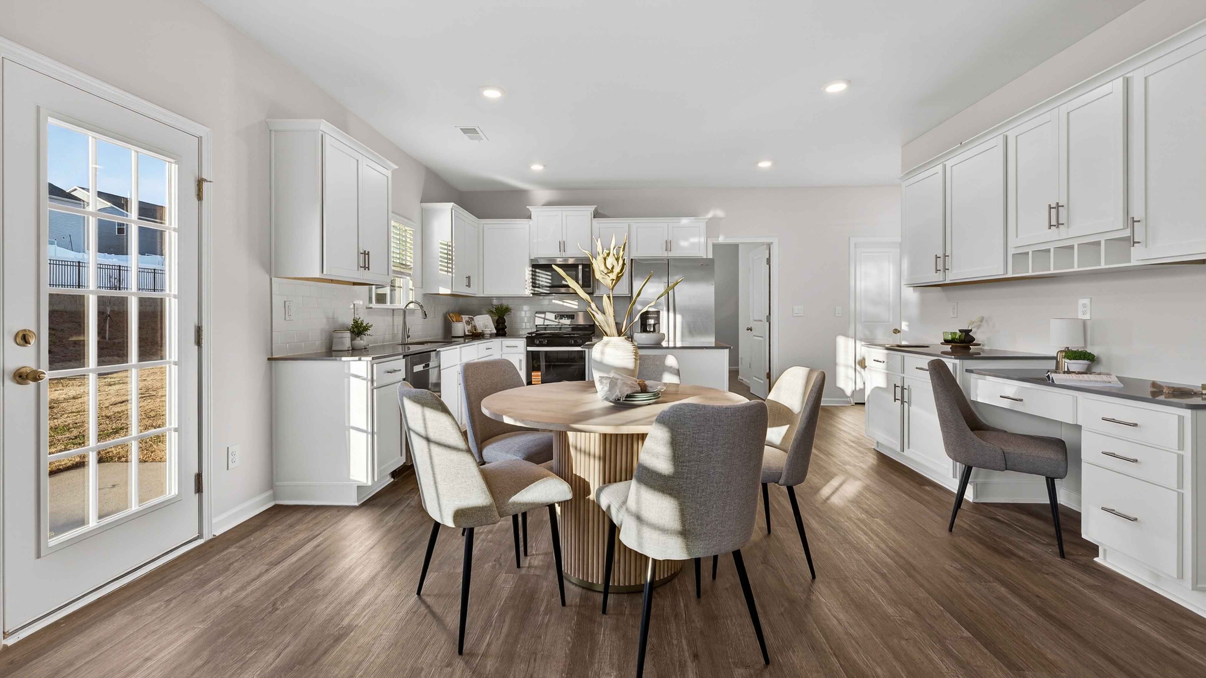 Kitchen with island, white cabinets