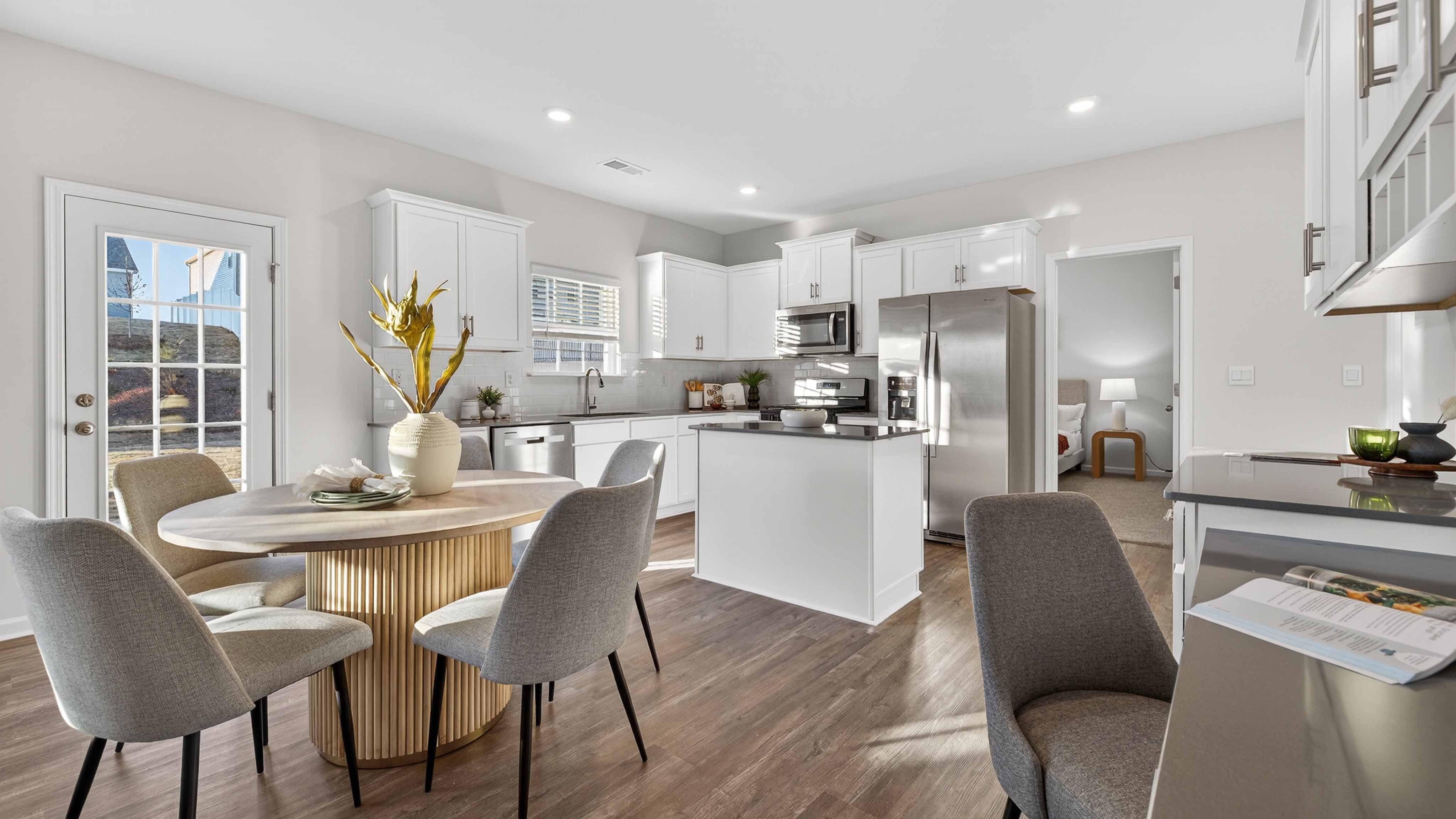 Kitchen with island, white cabinets
