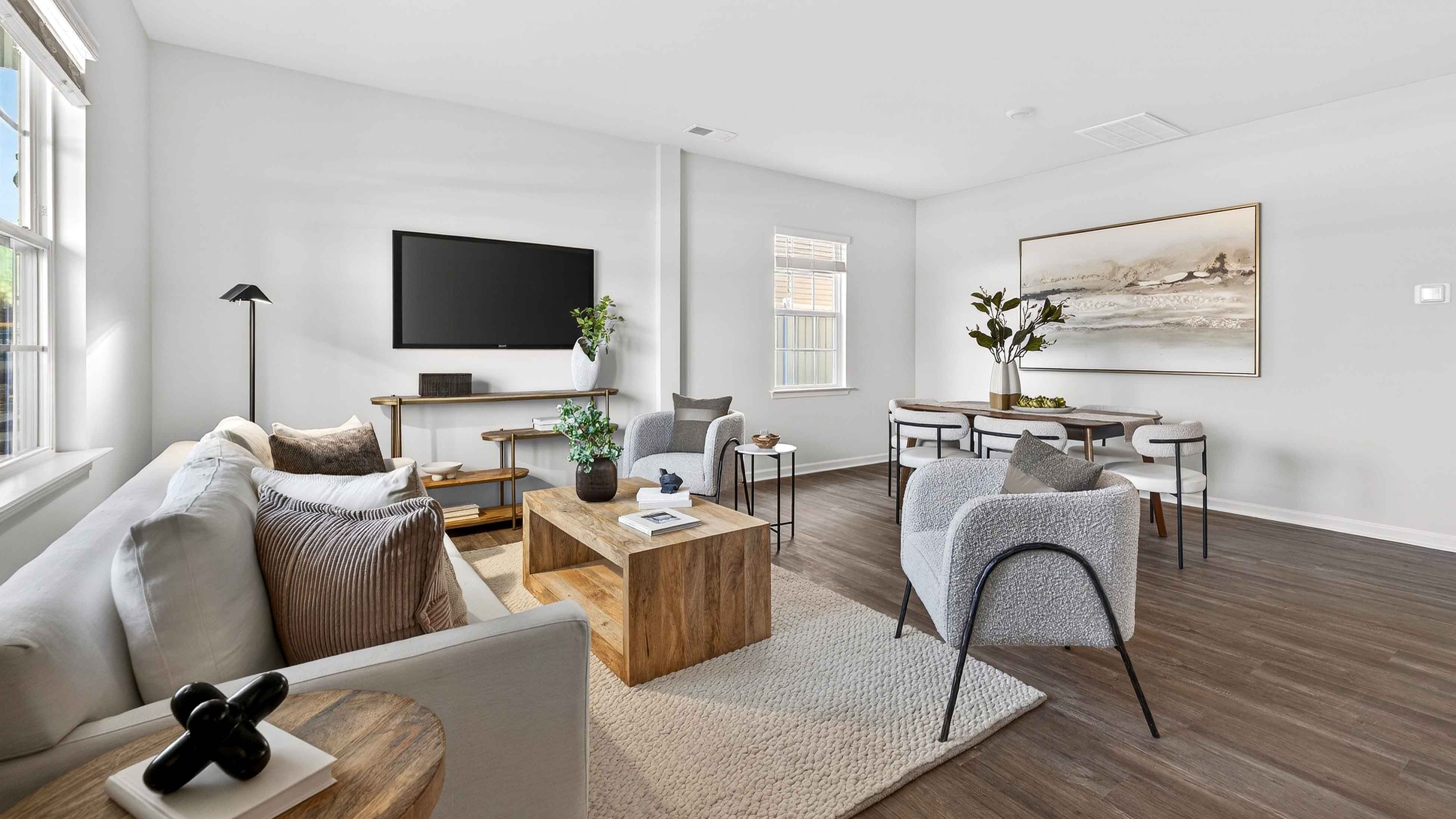 Spacious family room with large window and fireplace