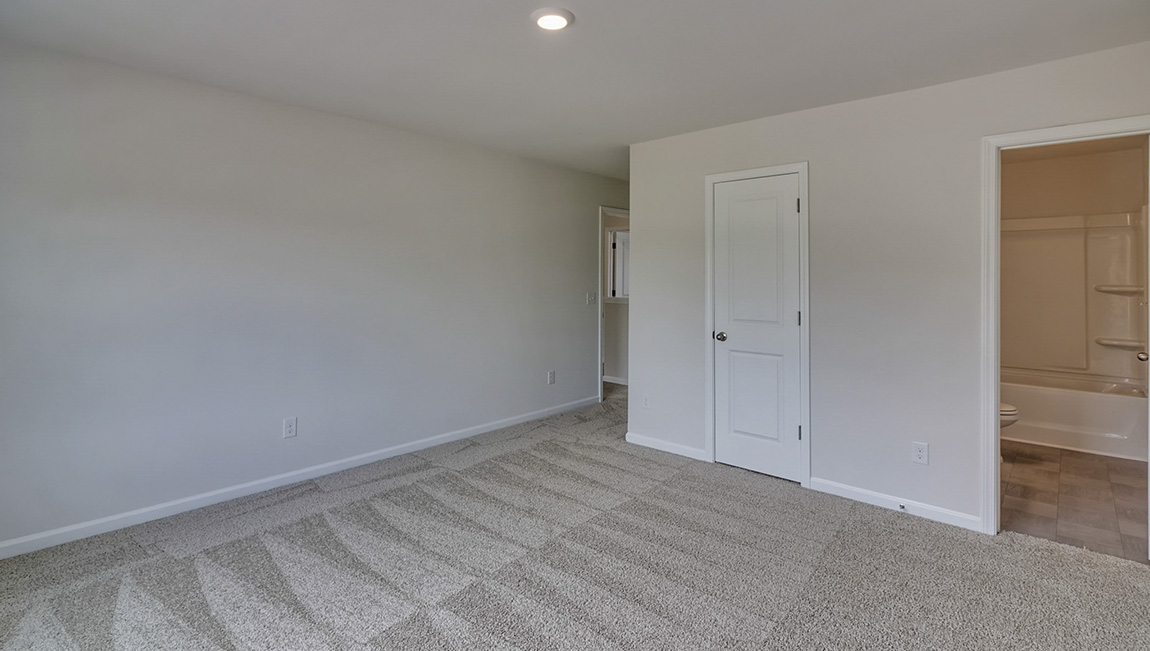 Carpeted bedroom