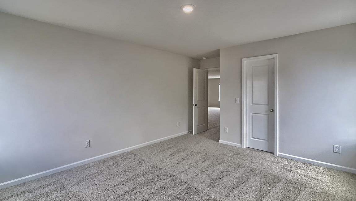 Carpeted bedroom