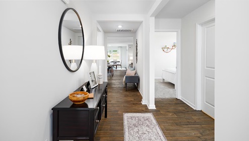 Welcoming foyer with vinyl flooring, view of interior. New Home in Charlotte, North Carolina