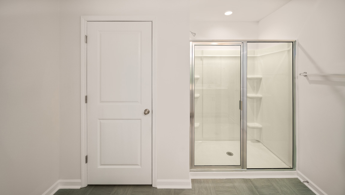 Primary bathroom with glass door shower