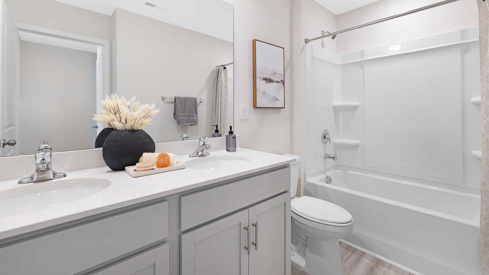 Bathroom with bathtub and shower combination