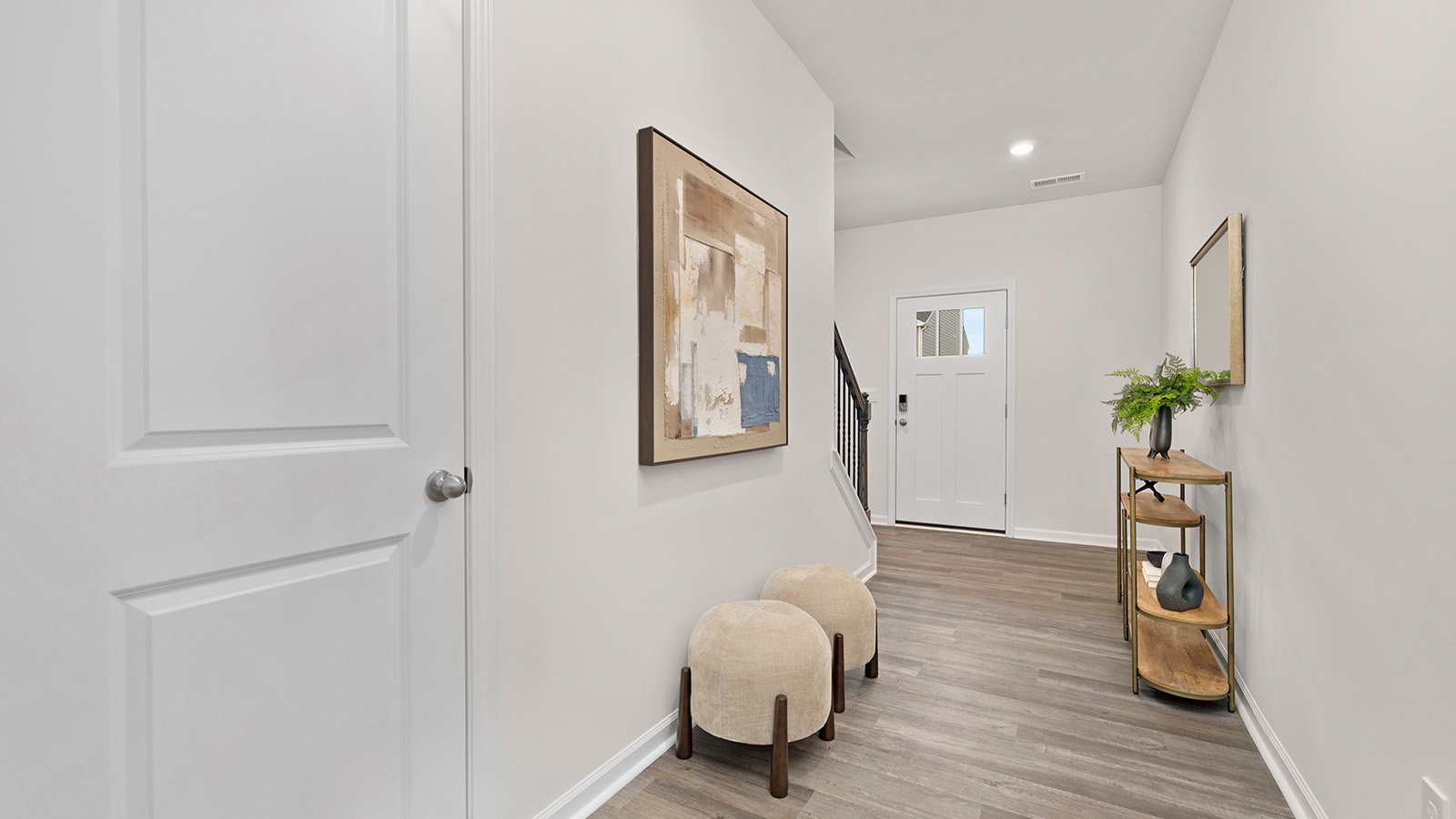 Welcoming foyer view of staircase