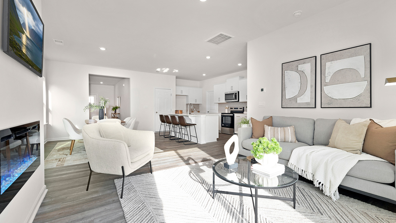 Family room with fireplace and large window
