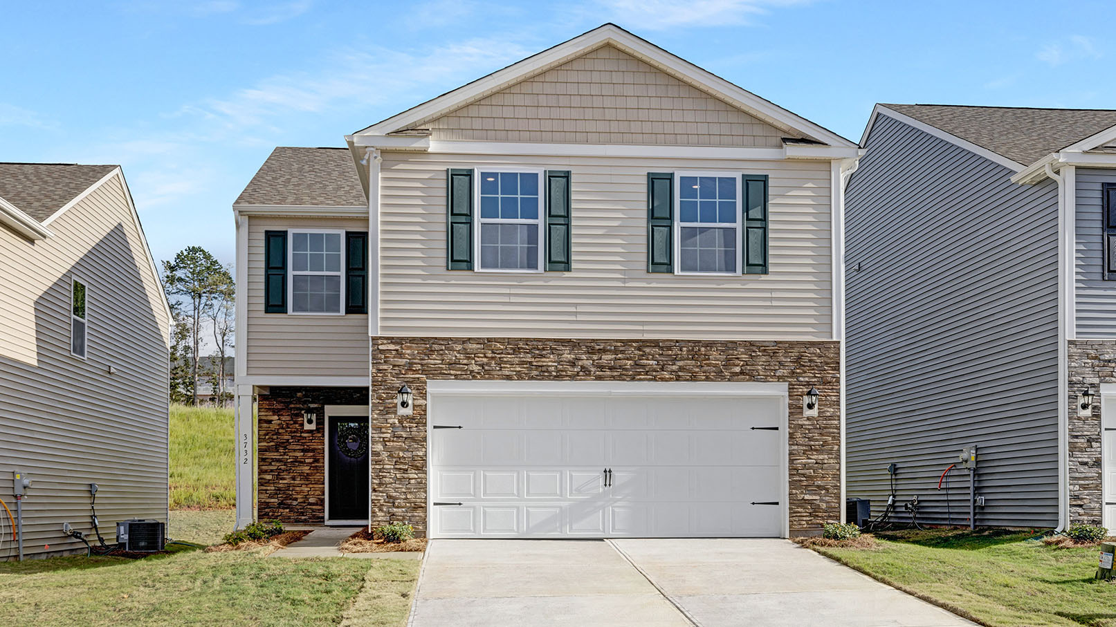 Aisle front exterior rendering with siding and two car garage