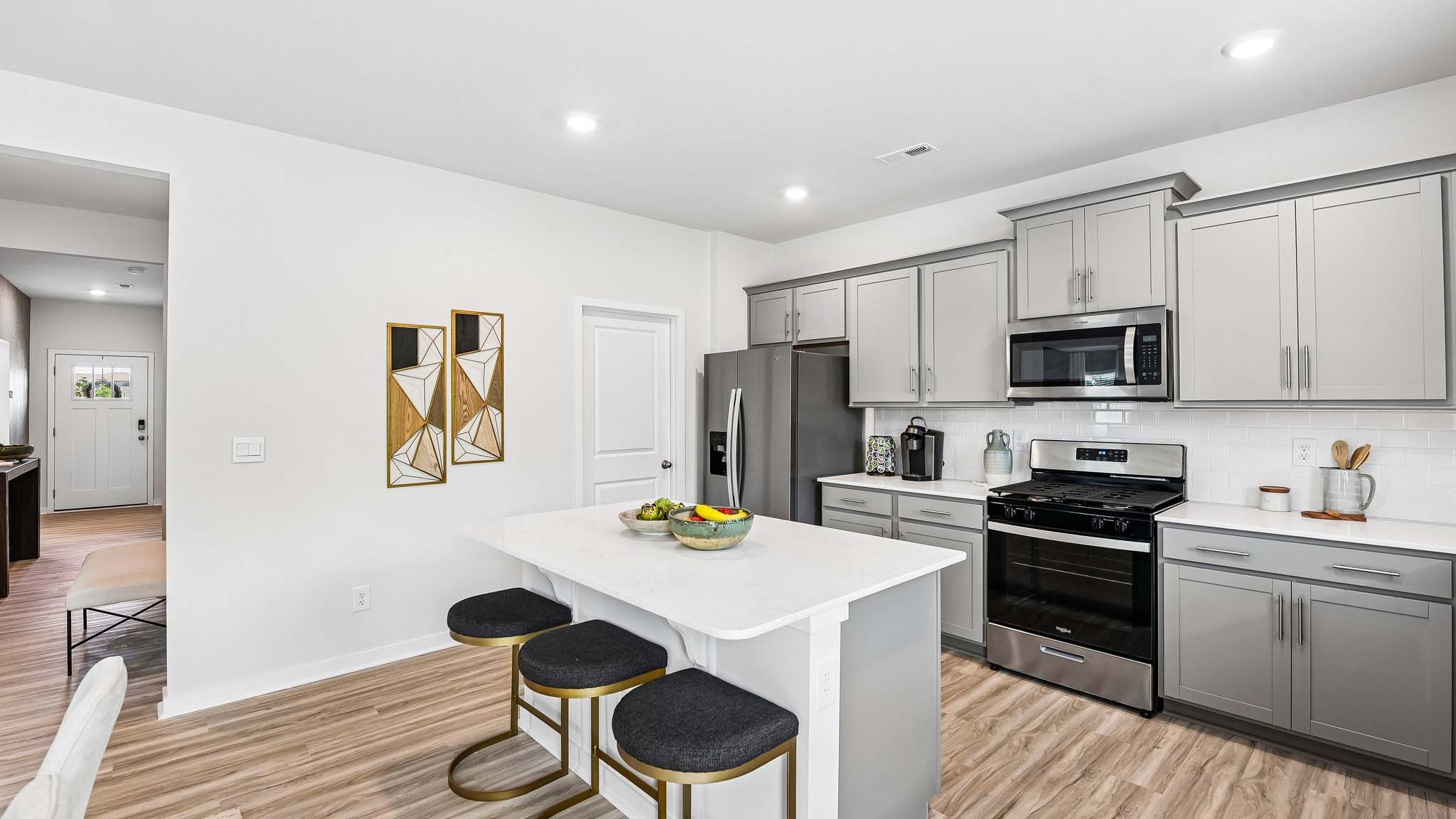 kitchen and island with quartz countertops