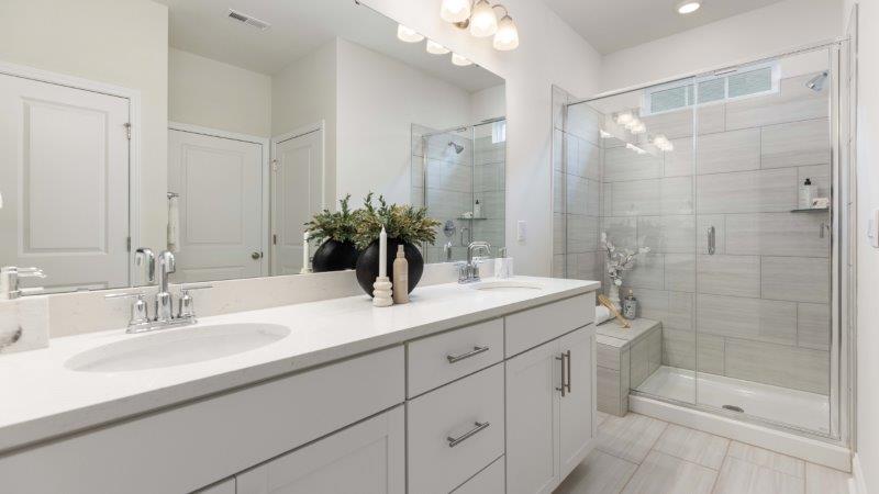 Brookside Arlington primary bathroom with glass door shower
