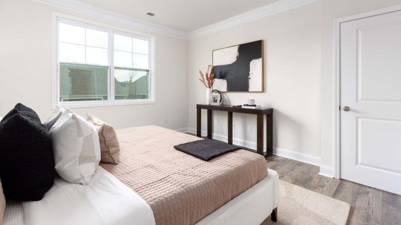 Brookside Arlington primary bedroom, carpeted with large window