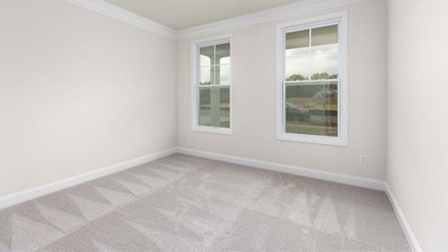 Brookside Arlington carpeted bedroom with two windows
