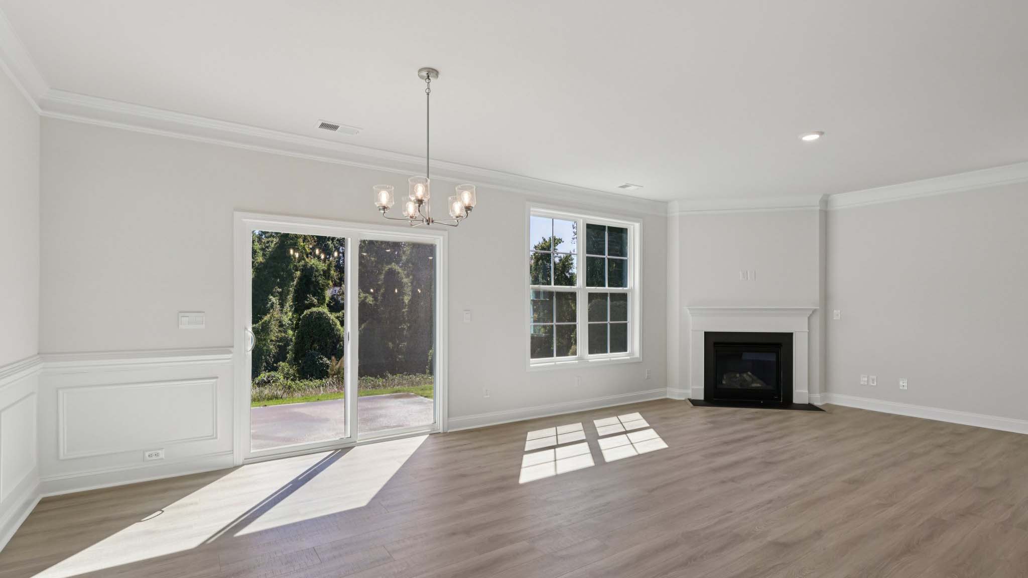 breakfast area beside kitchen with sliding glass back door