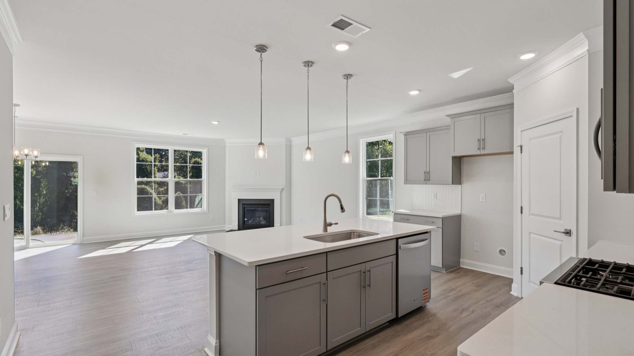 kitchen and island with stainless steel appliances