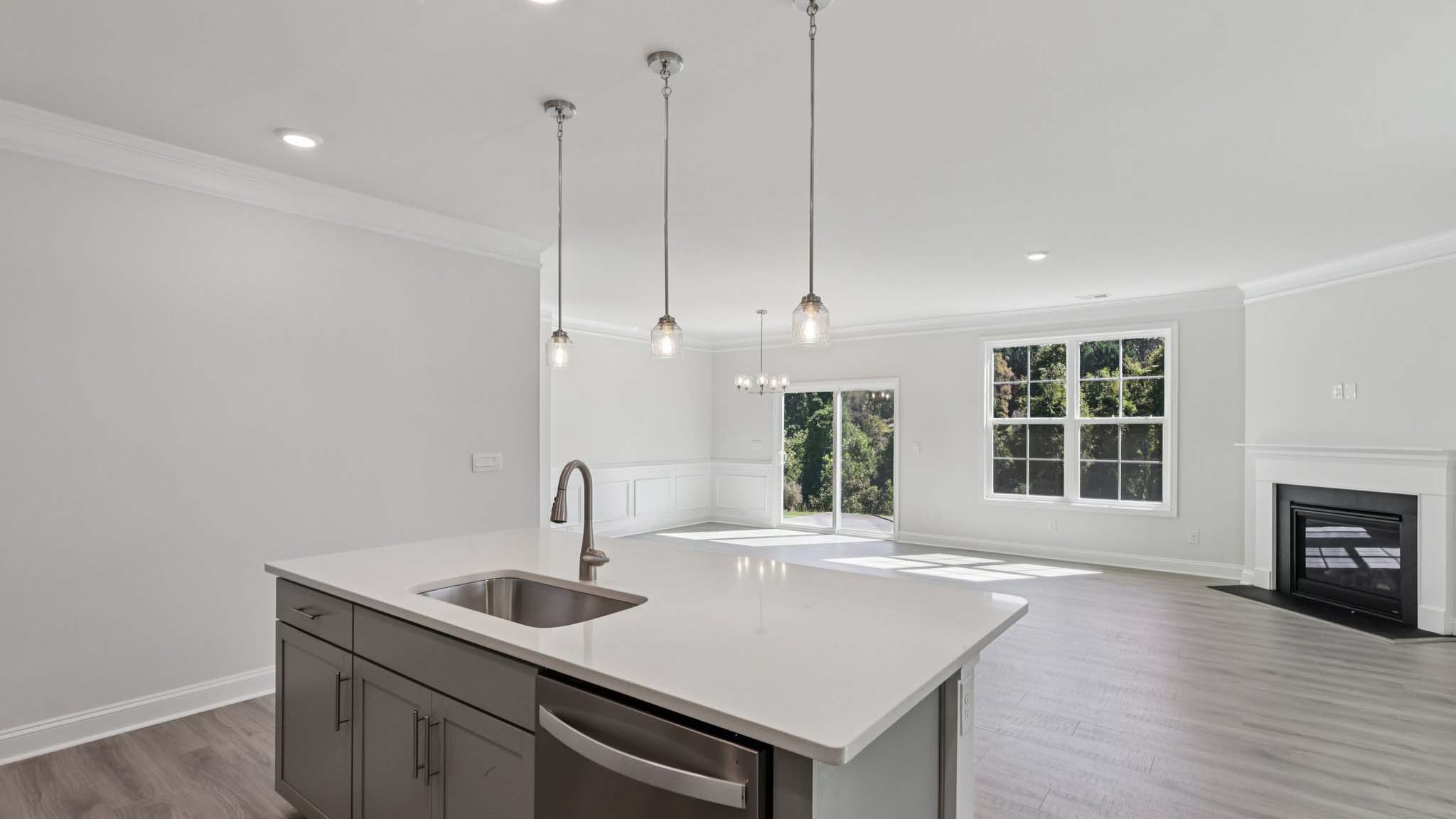kitchen and island with stainless steel appliances