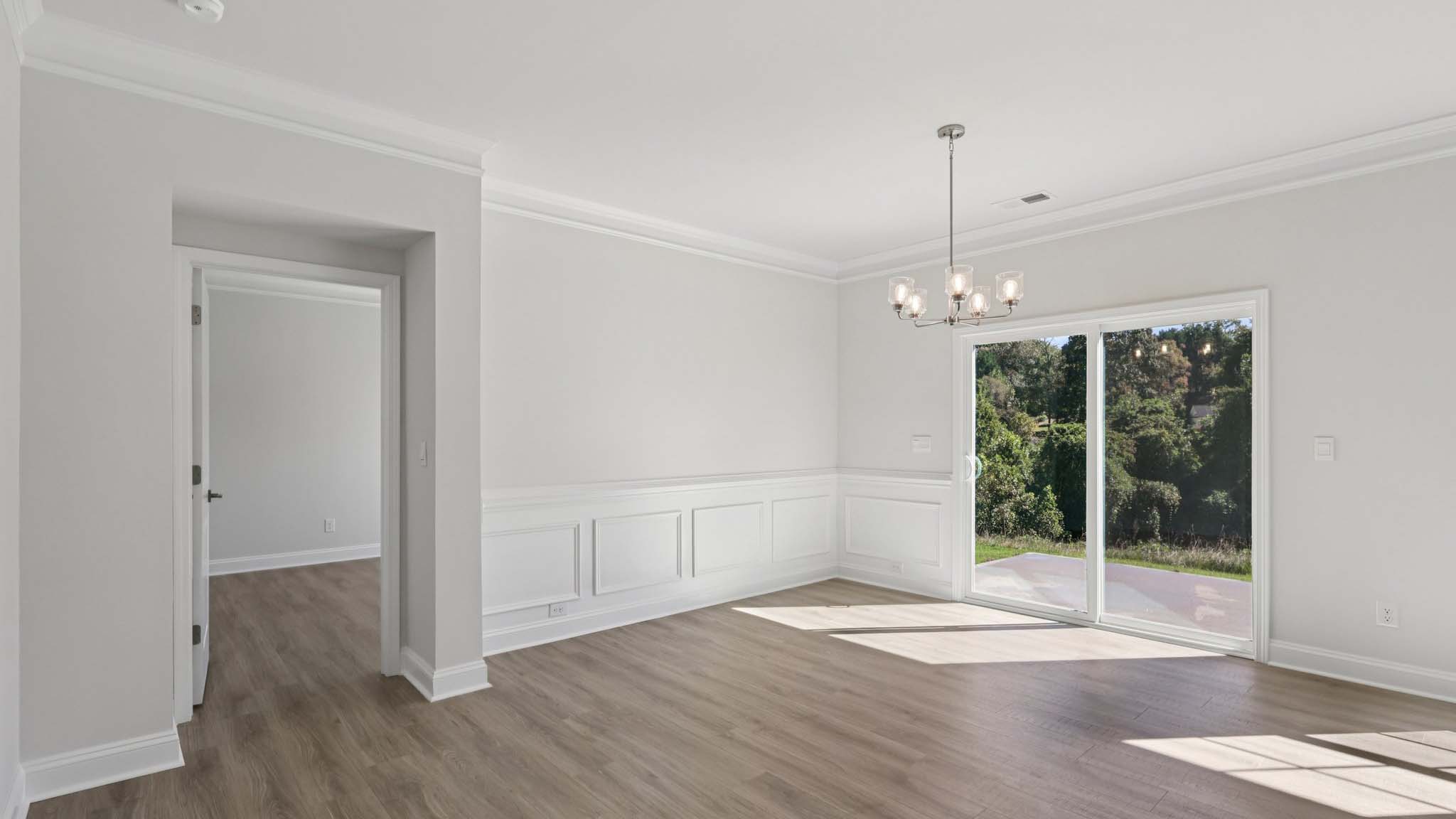 breakfast area beside kitchen with sliding glass back door