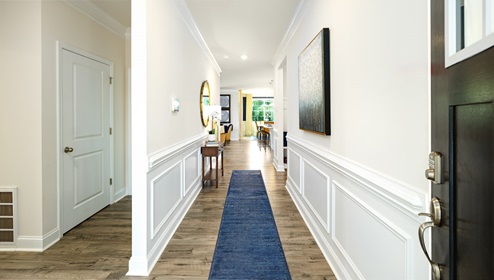 Welcoming foyer, view of home interior, with wood floors