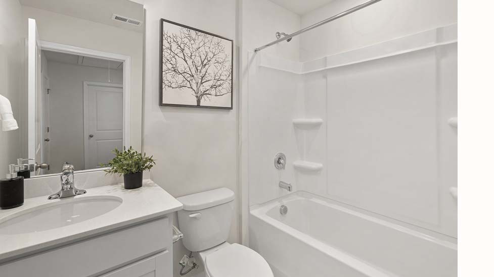 Bathroom with bathtub shower combo