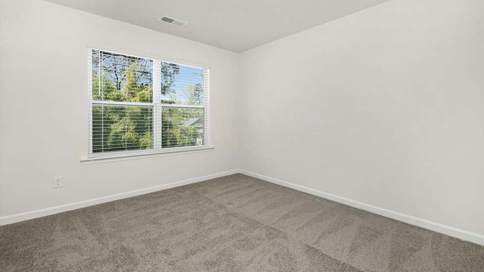 Carpeted bedroom