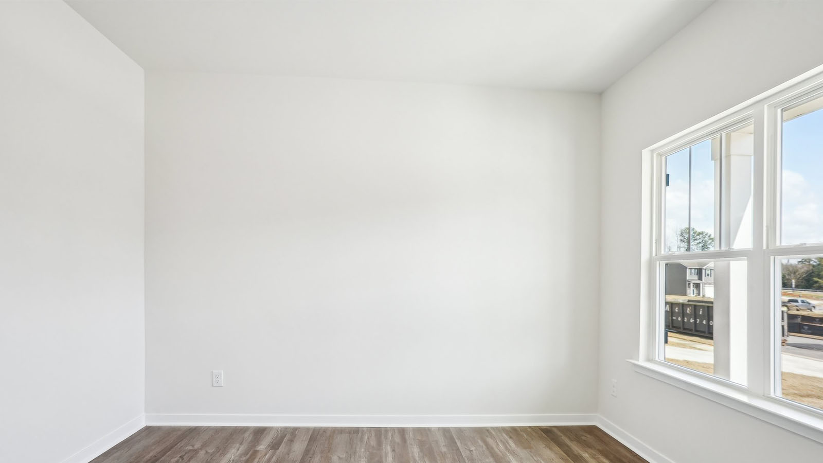 Flex or dining room with french doors and large window