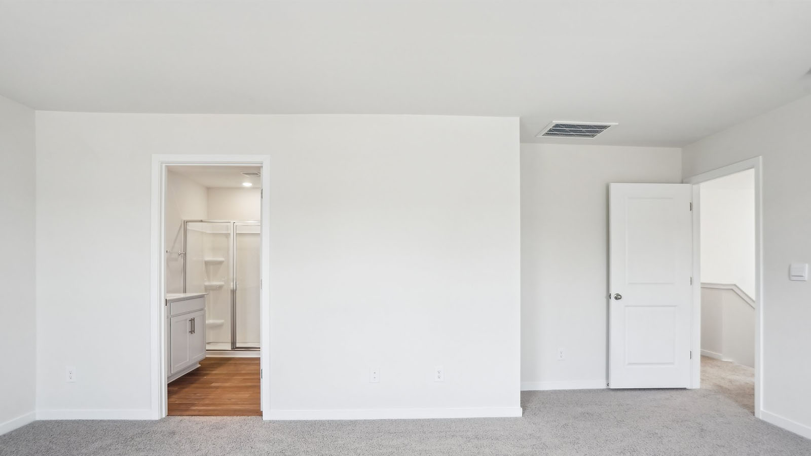 Carpeted bedroom with  window