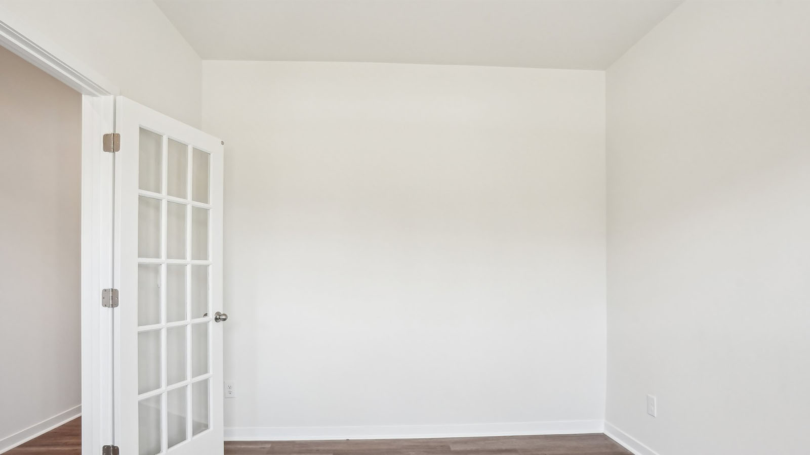 Flex or dining room with french doors and large window