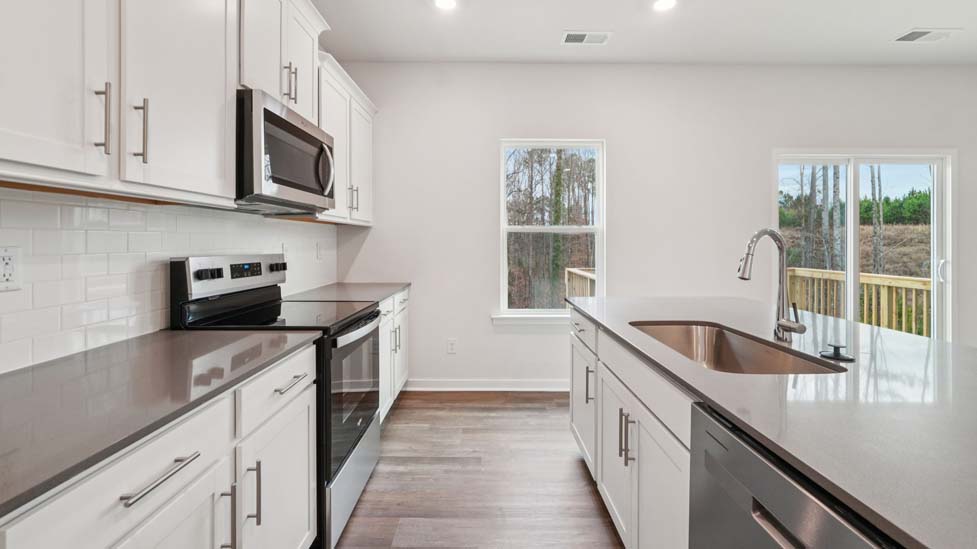 Kicthen and island with stainless steel appliances