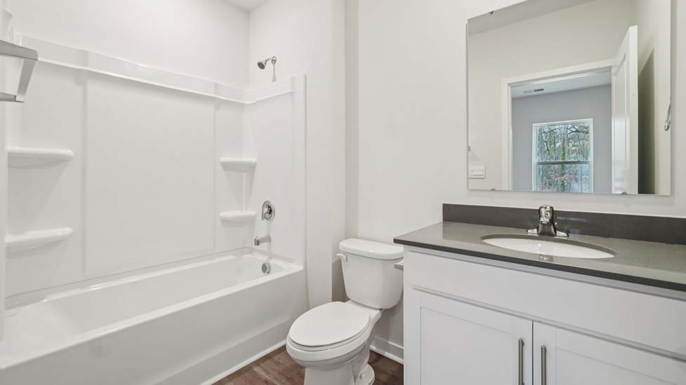 Bathroom with bathtub shower combo