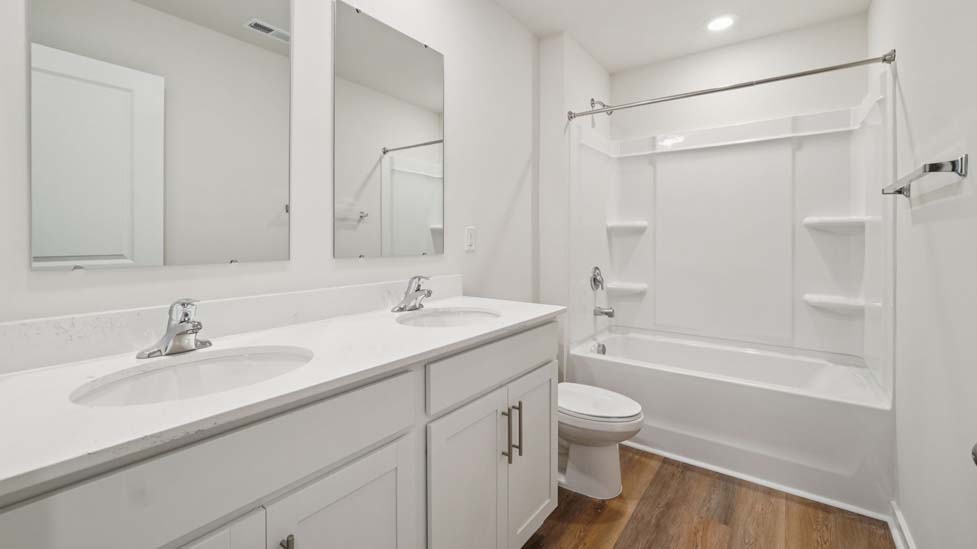 Bathroom with bathtub shower combo