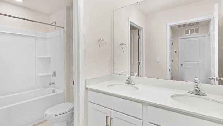 bathroom with bathtub and shower combination