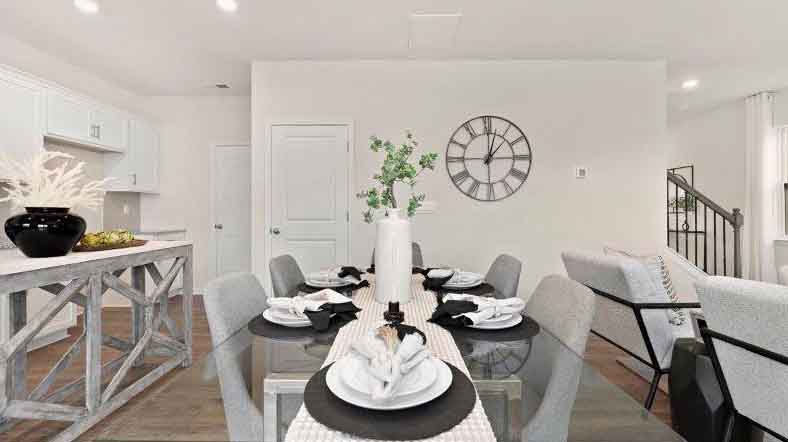 Dining area and living room beside kitchen