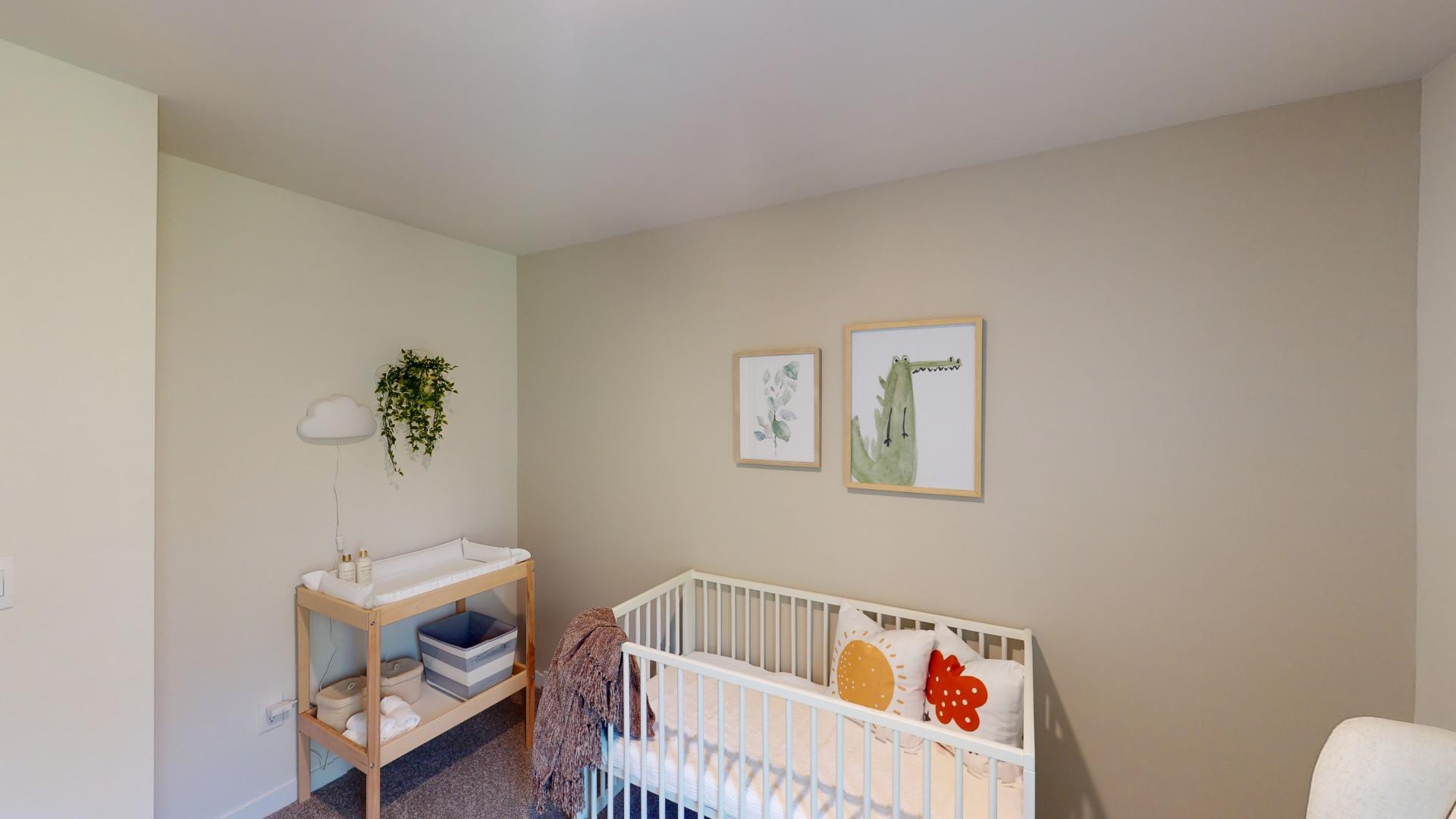 Carpeted bedroom with window