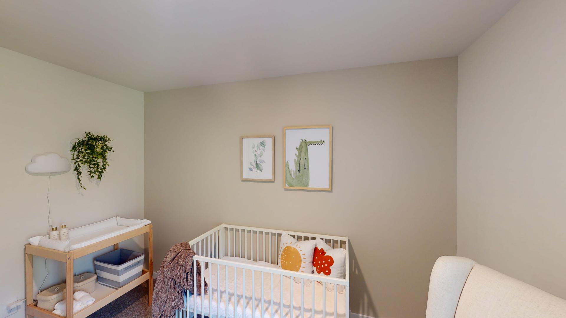 Carpeted bedroom with window