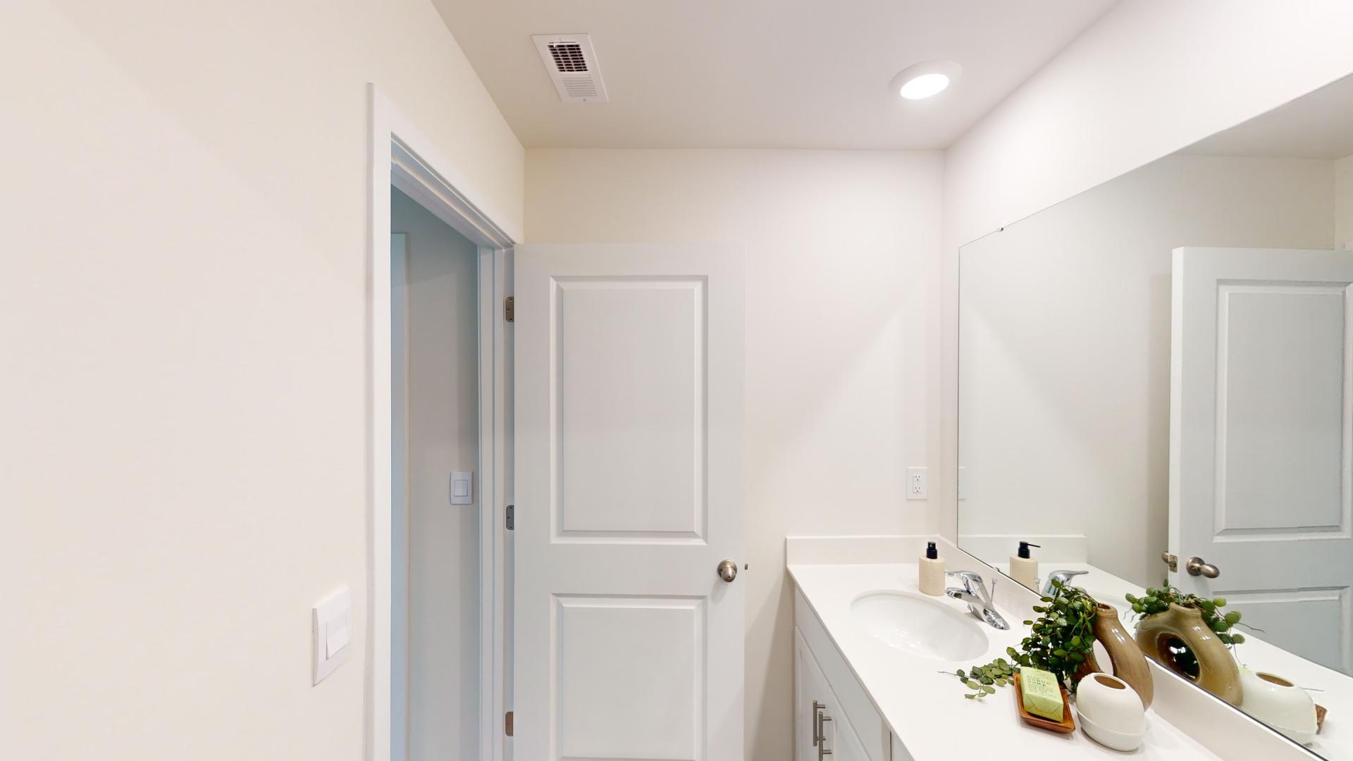 bathroom with bathtub and shower combination