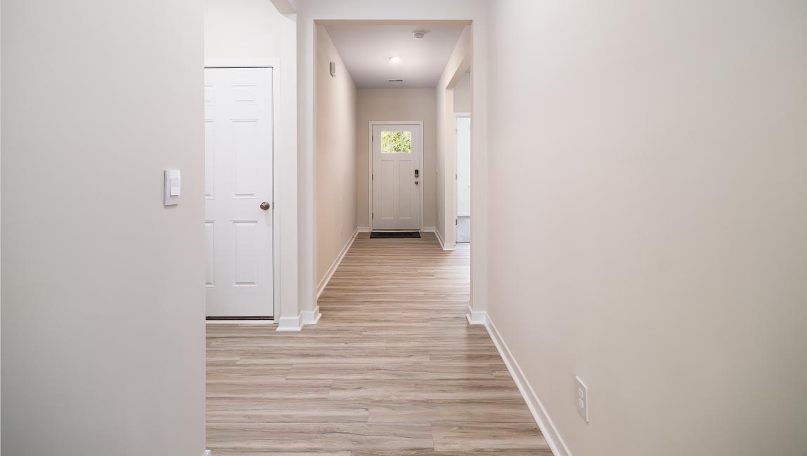 Welcoming foyer with wood floors, view of home interior