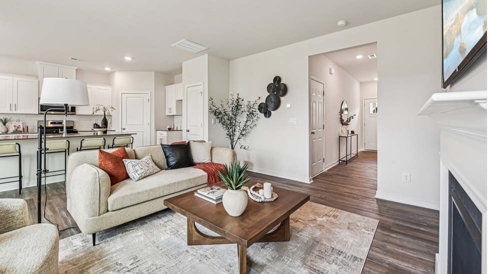 living room with fireplace and windows