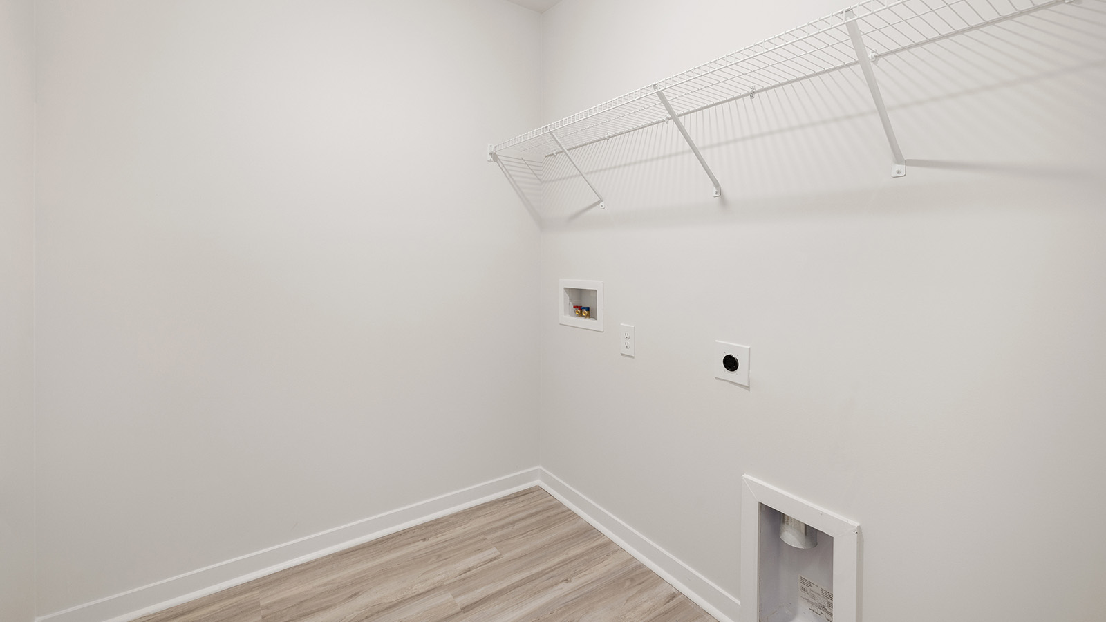 Laundry room with racks