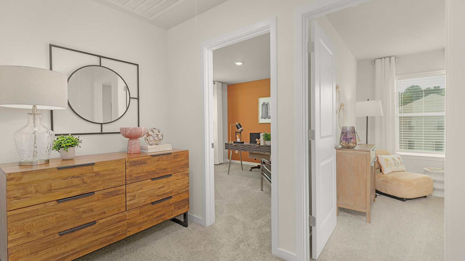 Carpeted bedroom with small window