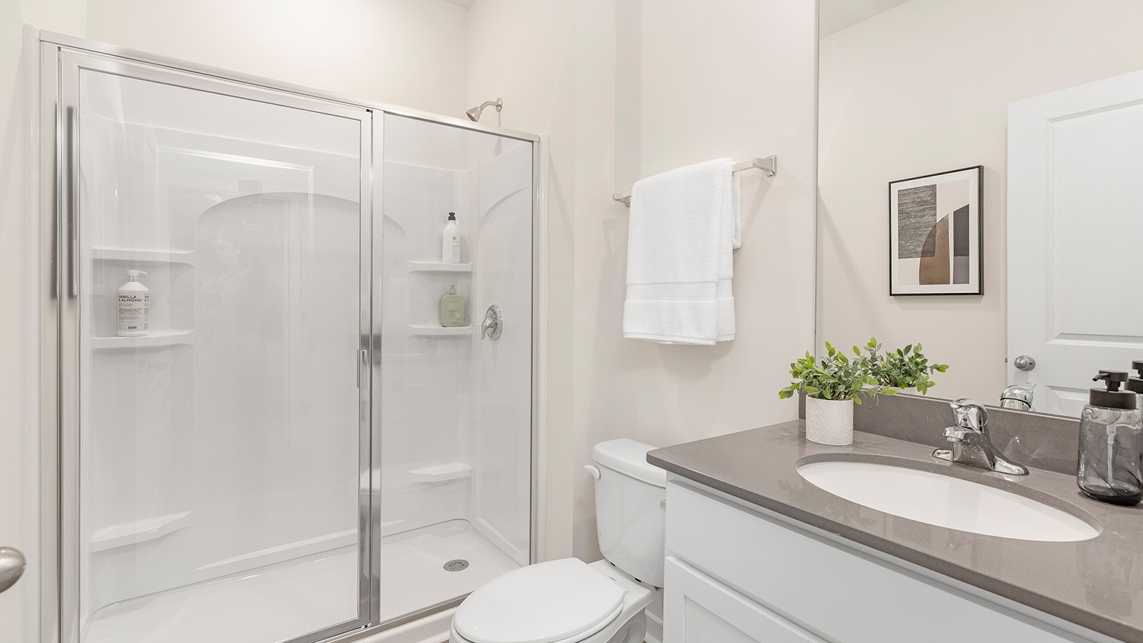 Bathroom with standing glass shower