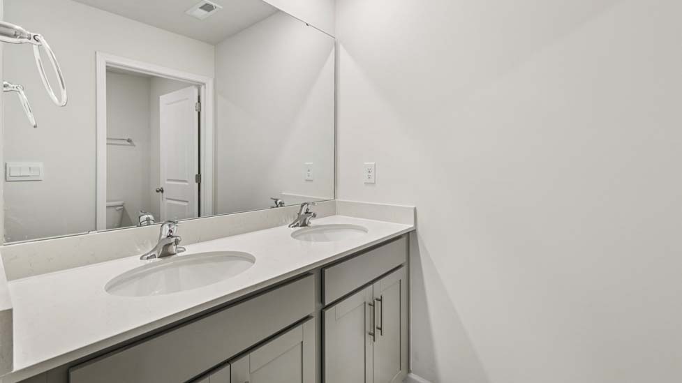 bathroom with bathtub shower combination