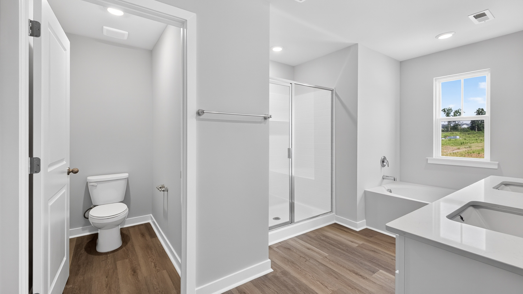 primary bathroom with standing glass shower