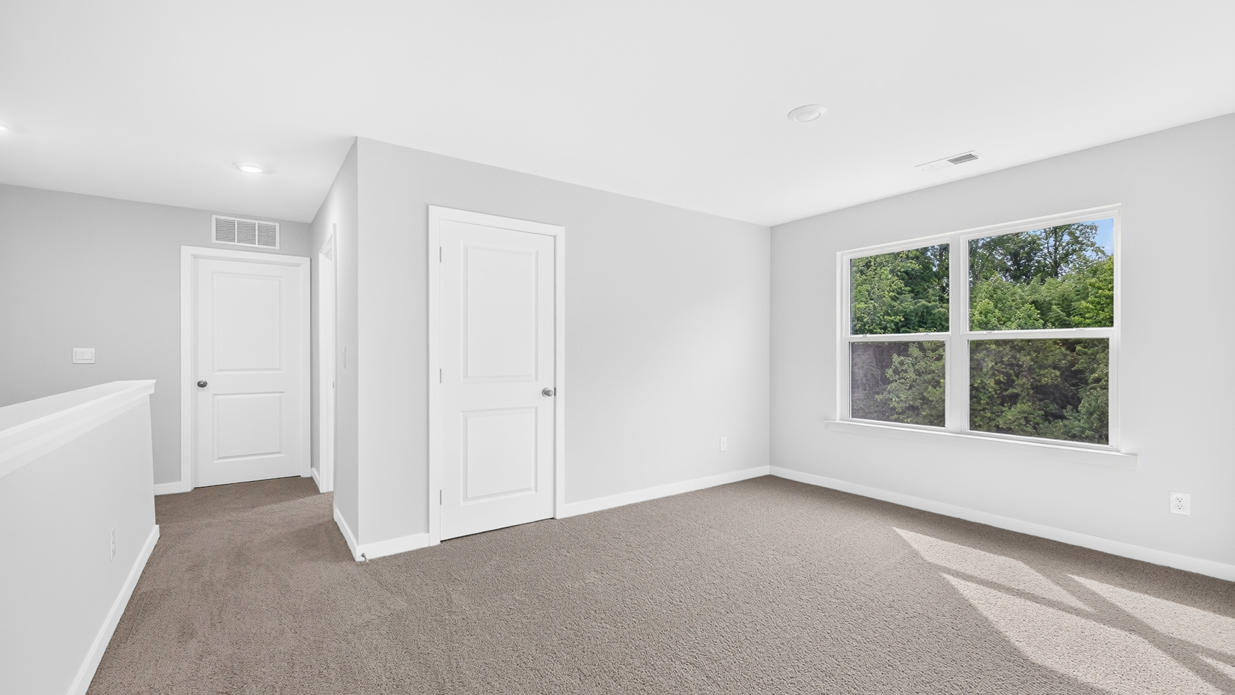 Upstairs carpeted loft