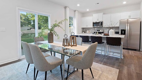 Dining room beside kitchen with sliding glass back door, New home near Charlotte, NC