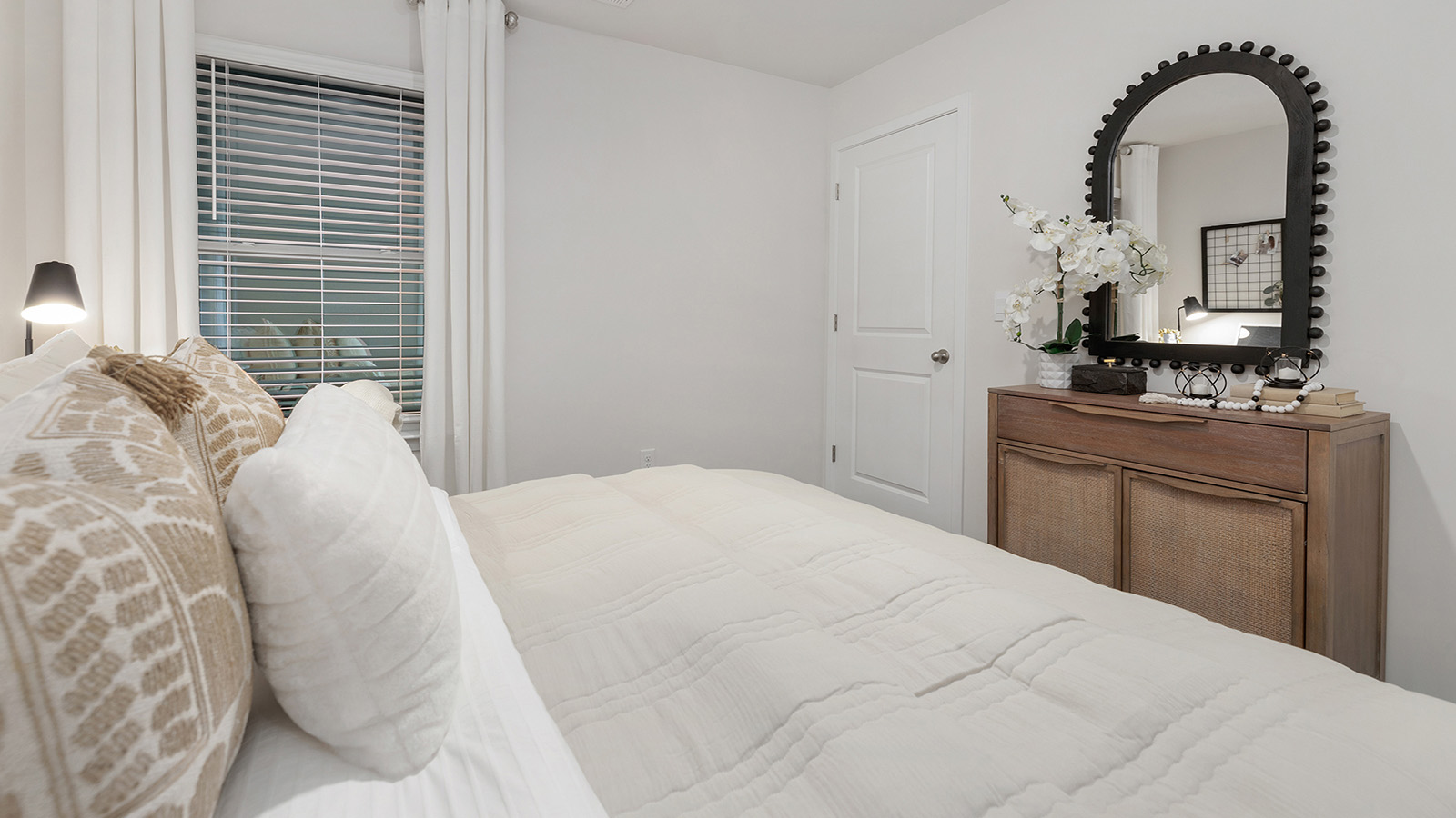 Carpeted bedroom  with small window