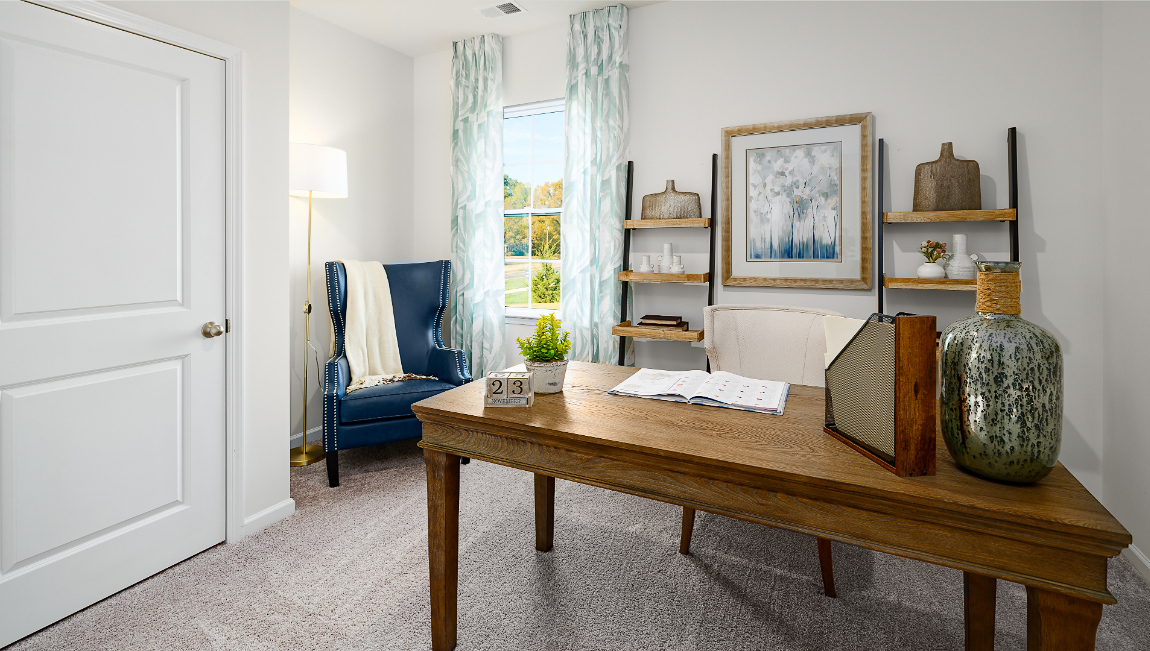 Office space, carpeted, with large window