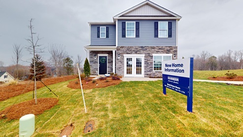 Falls at Hickory Robie Model Front Exterior with stone and siding. New Home in Charlotte, North Carolina.