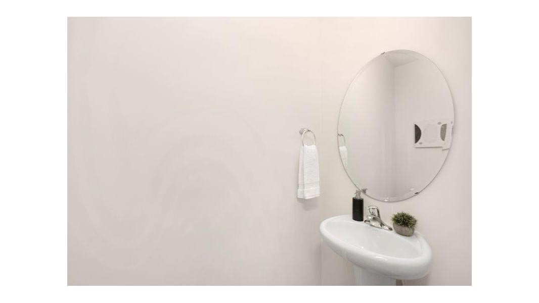 Powder bathroom with toilet and sink