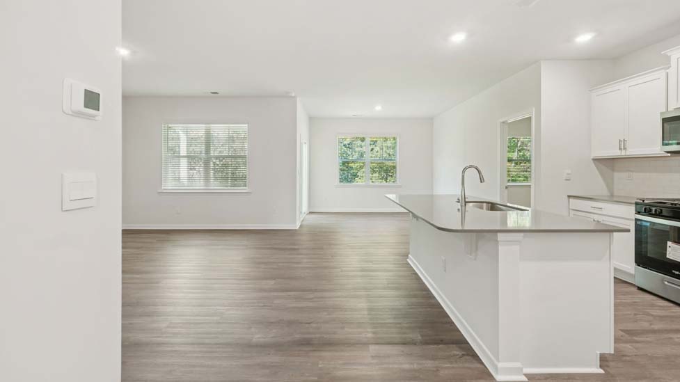 Welcoming foyer with wood floors, view of home interior